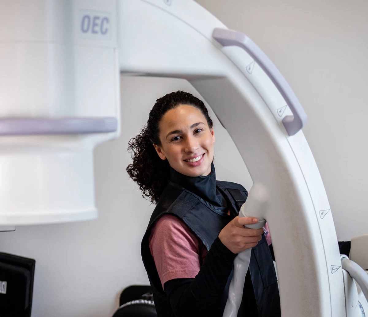 Woman operating medical equipment